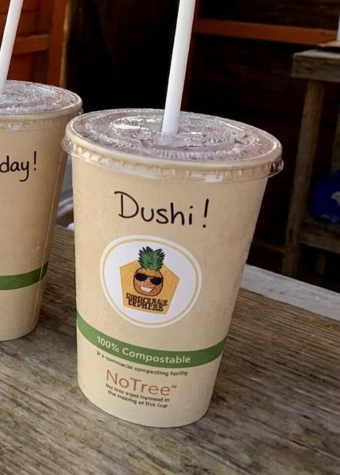 Pineapple Express smoothie cup with Dushi! handwritten on it